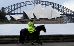 Policer offers patrol on their service horses in front of the Sydney Opera House on September 13, 2021 amid Covid-19 pendamic.