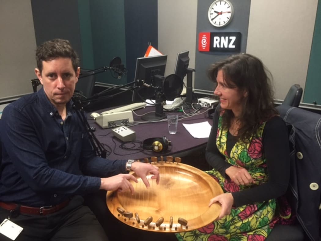 Music therapist Claire Molyneux lets Wallace have a go with her sounding bowl