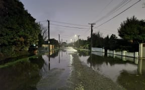 Greenpark Street in Hoon Hay on 26 July 2022, where residents say it's the worst flooding they've ever seen.