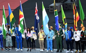 Flag bearers at the Birmingham Commonwealth Games closing ceremony.