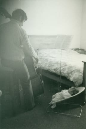 Simon Tipping playing bass to baby Nick Tipping