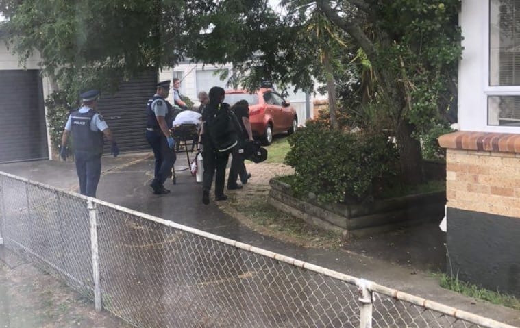 A child was taken from the property on a stretcher.