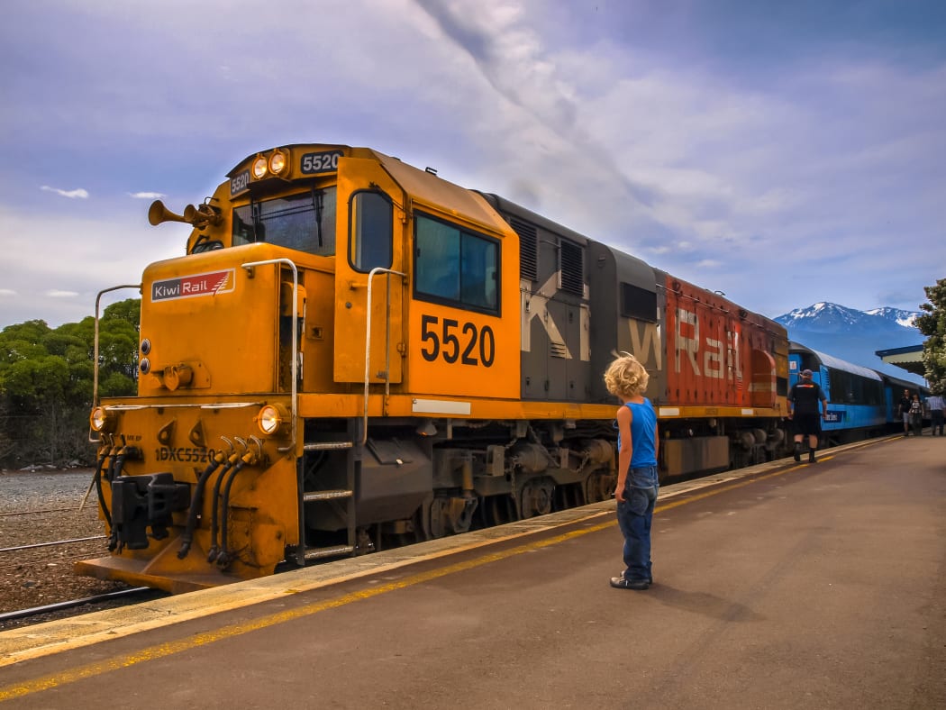 KiwiRail DXC 5520 Diesel Locomotive passenger train waiting at station in Kaikoura, New Zealand.