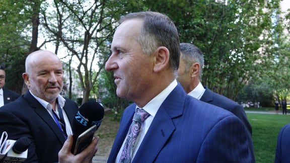 John Key arrives in Beijing with two senior ministers and 40 business delegates.