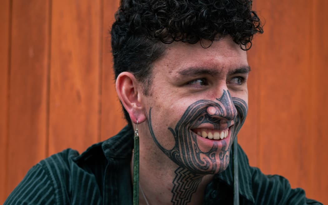 Tūranga Edmonds, Bass player for Alien Weaponry and Cultural content creator, uses his social platform to educate people on traditional Māori practices, including moko.