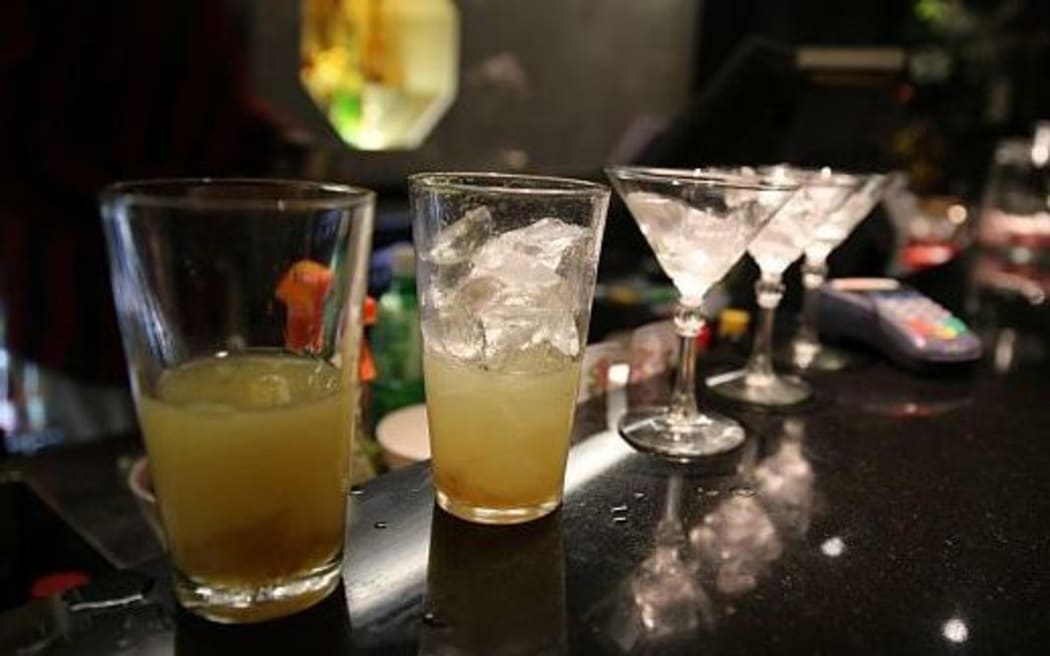 line of drinks in a bar