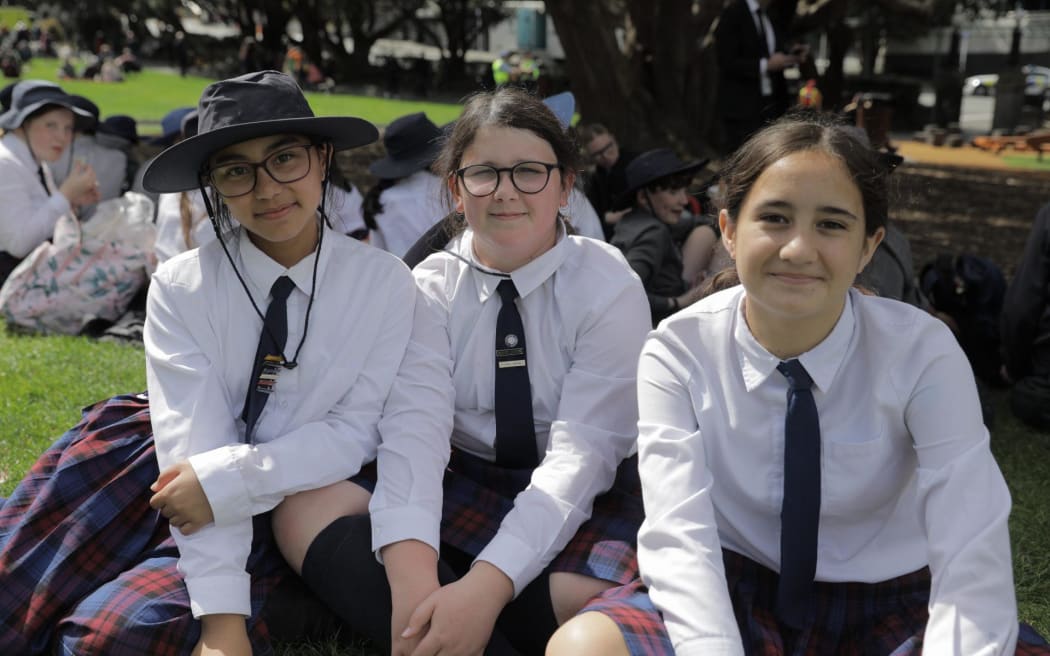 Maggie, Anika, Flounna and other students from Our Lady of Victories School in Christchurch flew to Wellington to watch the Queen Elizabeth II state memorial ceremony from the Parliament lawn today.