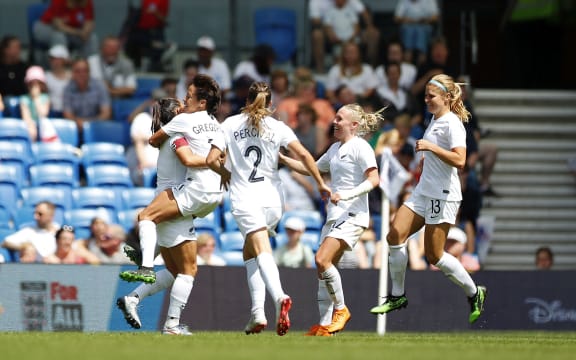 Sarah Gregorius of New Zealand celebrates scoring against England.