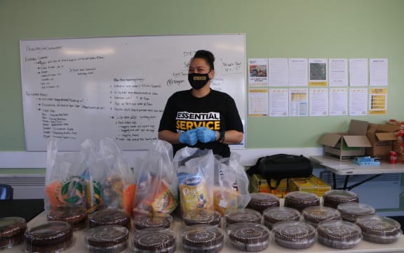 Tasha Teaurima with hampers for the Ōtara community under level 4 lockdown.