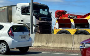 Truck v car crash on Auckland's northwestern motorway.