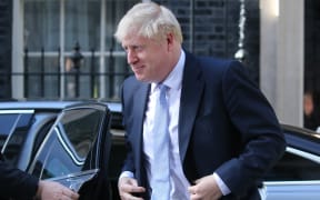 Britain's new Prime Minister Boris Johnson arrives back at 10 Downing Street in London on July 24, 2019.