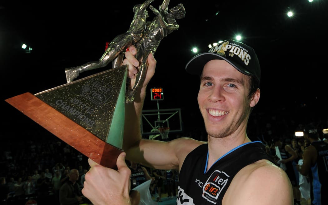 Tom Abercrombie with the Championship trophy during the iinet ANBL Basketball Finals v Perth Wildcats 2012