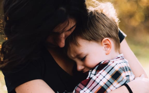 mother and crying son