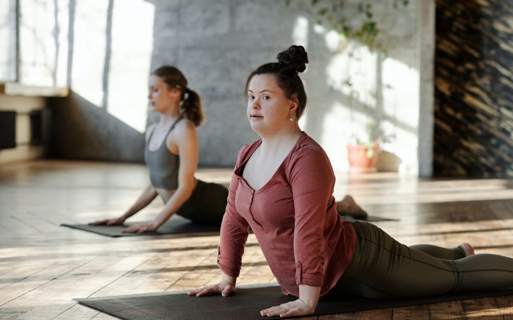 woman with intellectual disability in yoga class