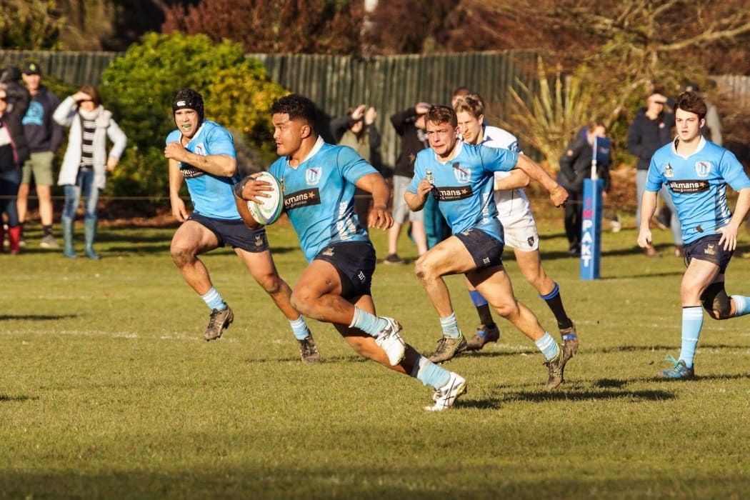 Siua Maile runs the ball up for his Shirley club in Christchurch