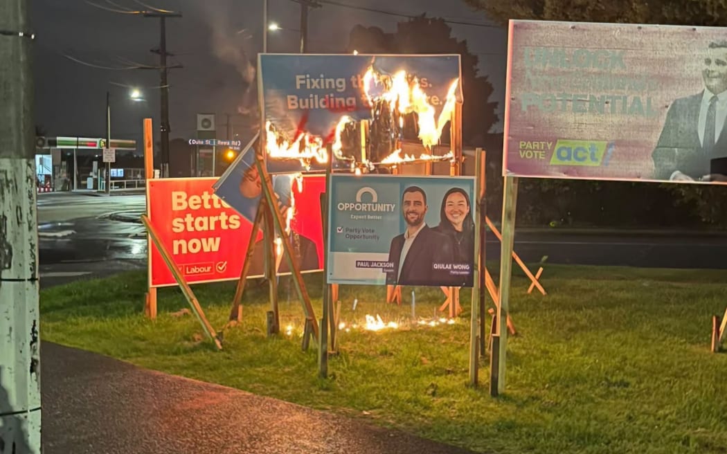 Election signage deliberately set on fire, National MP Carlos Cheung ...