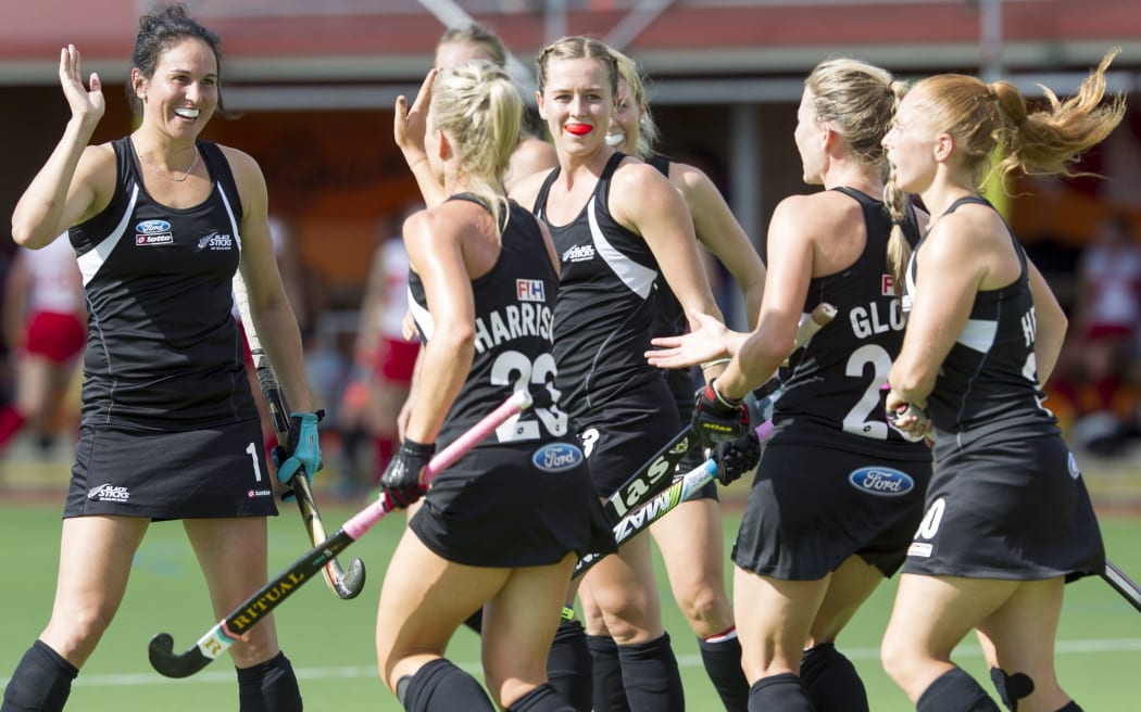The Black Sticks celebrate a goal.