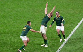 South Africa players celebrate winning the Rugby World Cup quarter-final against France, 2023.
