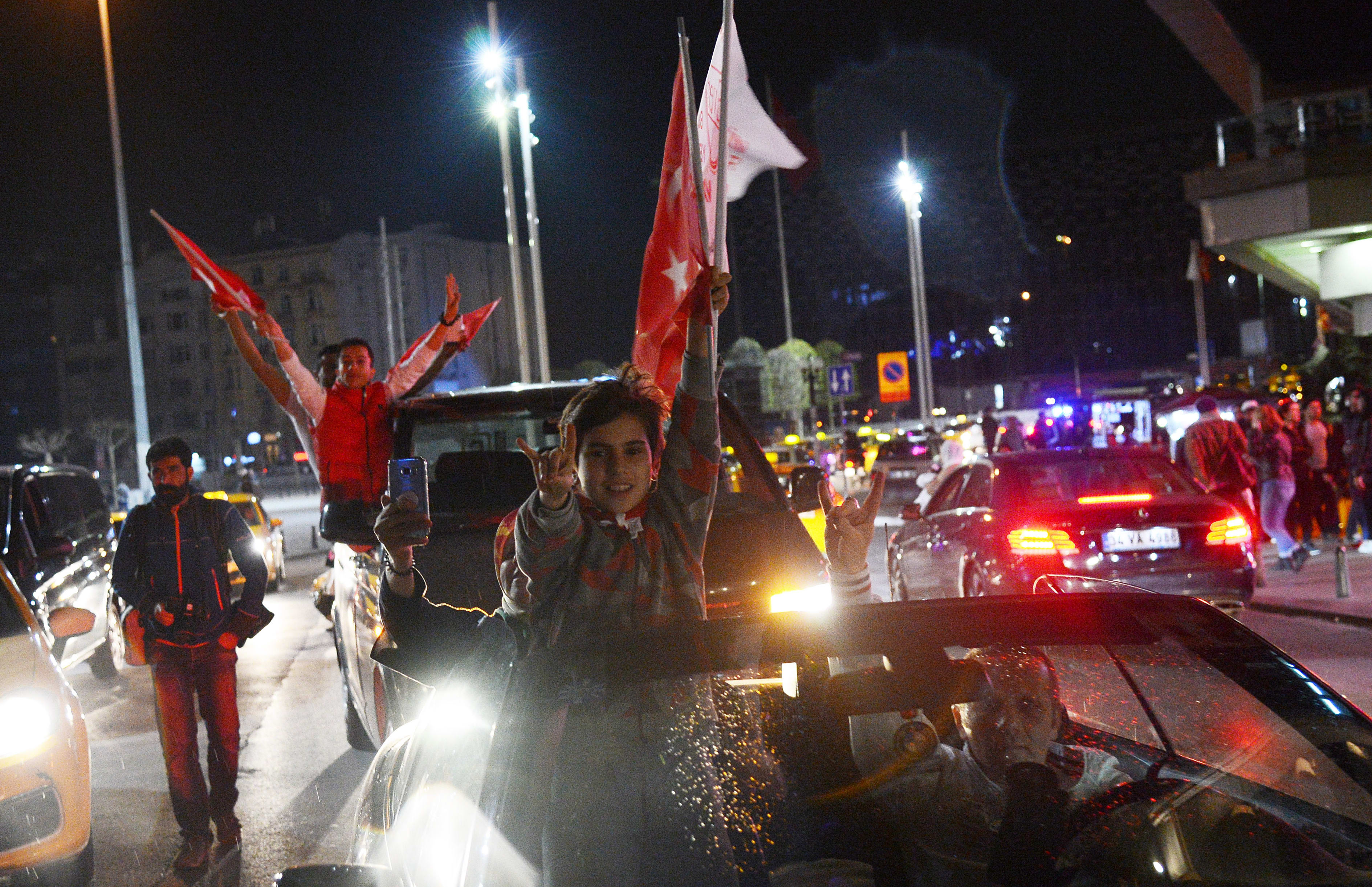 Supporters of Turkish President Tayyip Erdogan celebrate victory in the Turkey's constitutional referendum.