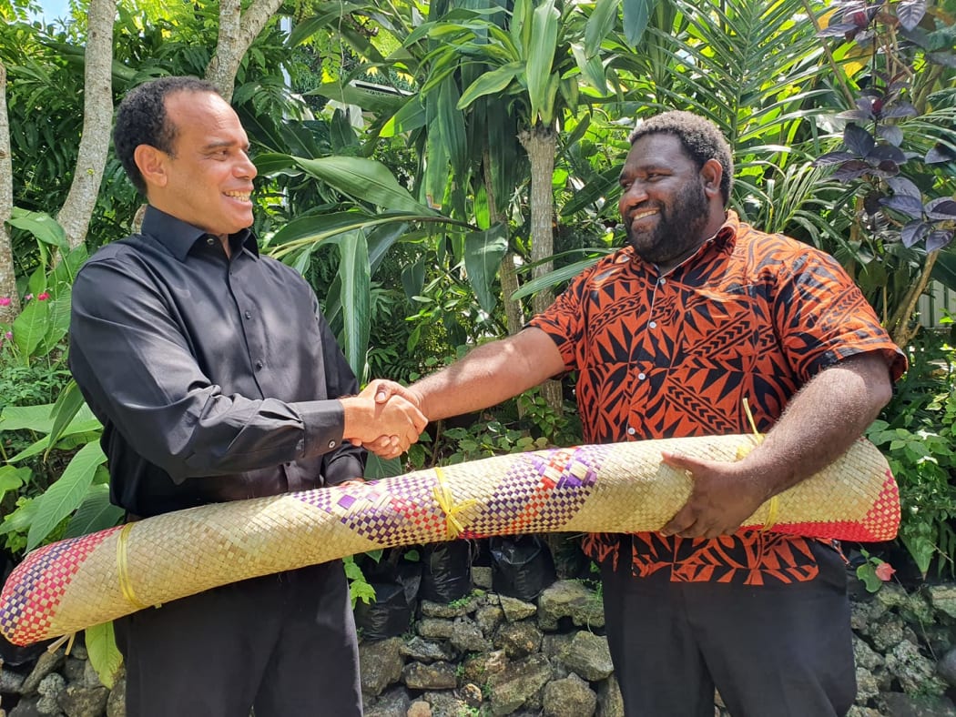 The Vanuatu opposition leader, Ralph Regenvanu, (Left) welcomes the newly resigned former government MP Robin Kapapa to the fold. 3 September 2020