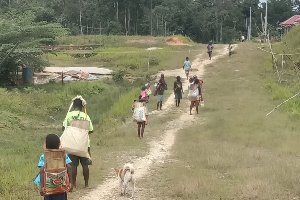 West Papuan villagers flee their homes due to armed conflict in Maybrat regency, September 2021.