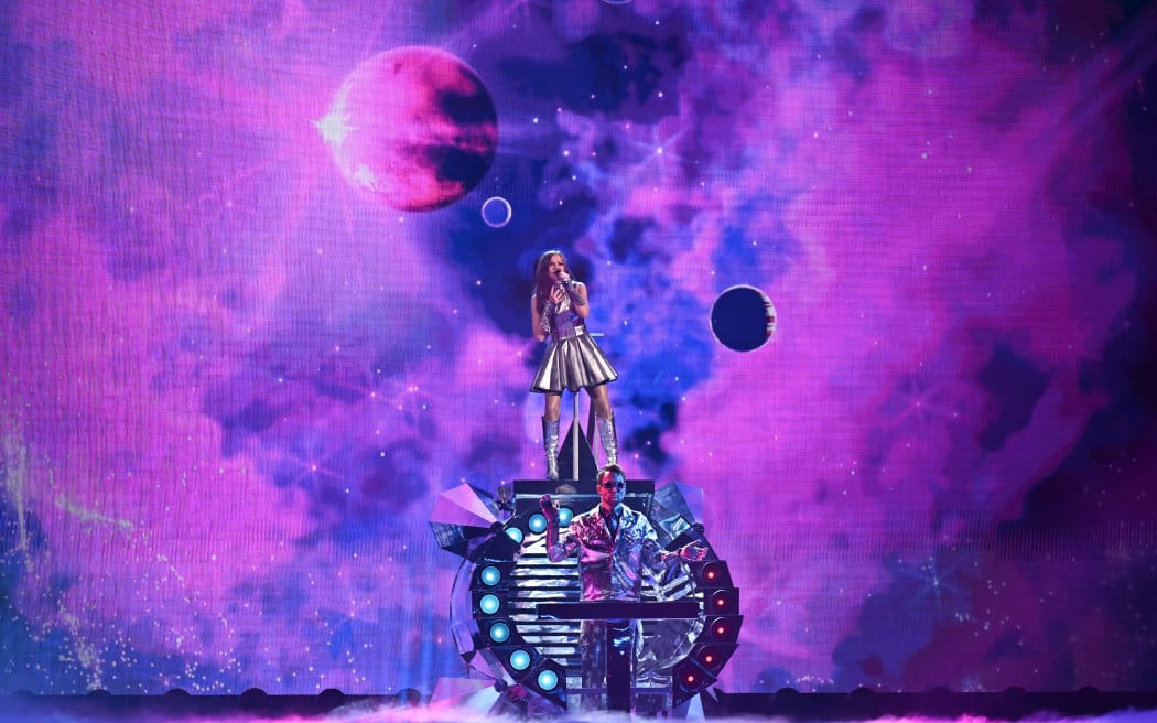 Norwegian singer Emmy representing Ireland with the song "Laika Party” performs during the dress rehearsal for the second semi-final of the Eurovision Song Contest 2025 at the St. Jakobshalle arena in Basel on May 14, 2025. (Photo by Fabrice COFFRINI / AFP)