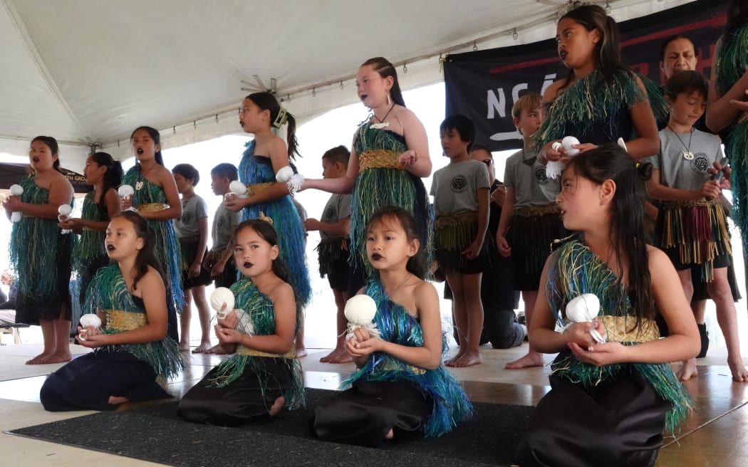 The girls of Te Kura Kaupapa Māori o Whangaroa demonstrate the poi.