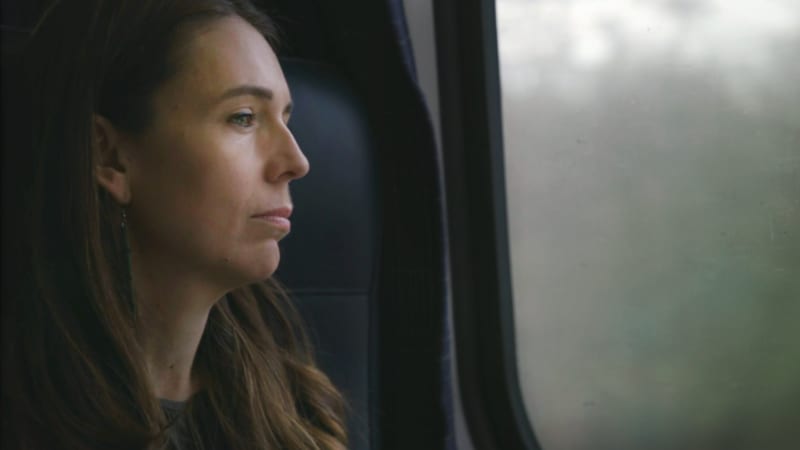 Jacinda Ardern stares out a window in a clip from a documentary - Prime Minister - about her tenure.