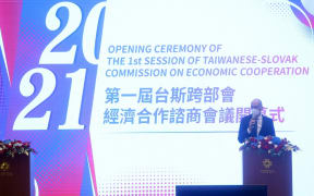 This picture taken and released by Taiwans Central News Agency (CNA) on December 6, 2021 shows Karol Galek, Slovakia's State Cecretary of the Ministry of Economy, speaking during the first session of Taiwanese-Slovak Commission on Economic Cooperation in Taipei.