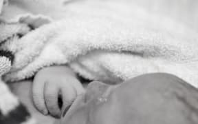 The images can be confronting but Nicola Devine's own research shows photography can help the grieving process.