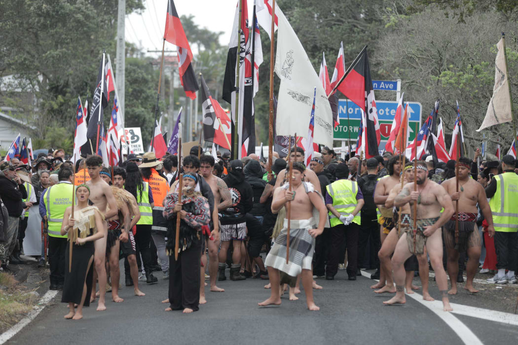 Kairākau lead the hīkoi as it prepares to cross the Auckland Harbour Bridge on 13 November 2024.