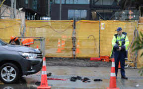 Police at the scene of the incident on Halsey Street in Auckland.