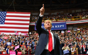 US President Donald Trump arrives for a "Make America Great Again" campaign rally at McKenzie Arena, in Chattanooga, Tennessee on November 4, 2018. (Photo by Nicholas Kamm / AFP)