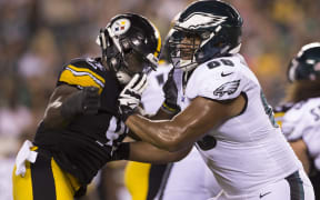Jordan Mailata (R) playing for the Philadelphia Eagles in a NFL pre-season match against the Pittsburgh Steelers.