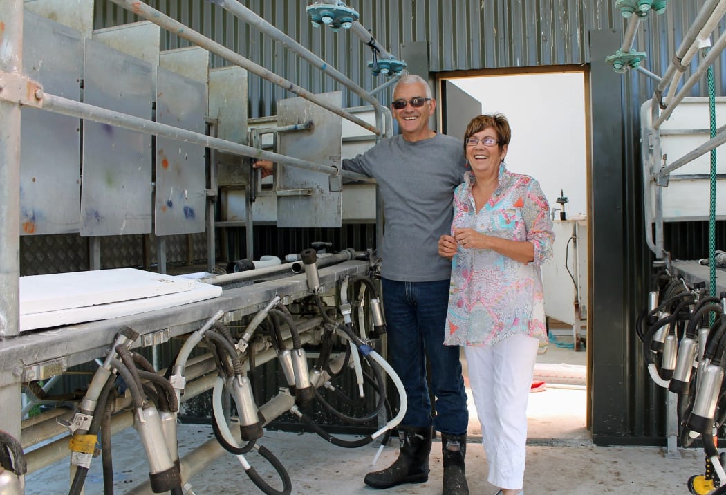 Guy and Sue Trafford in the milking shed