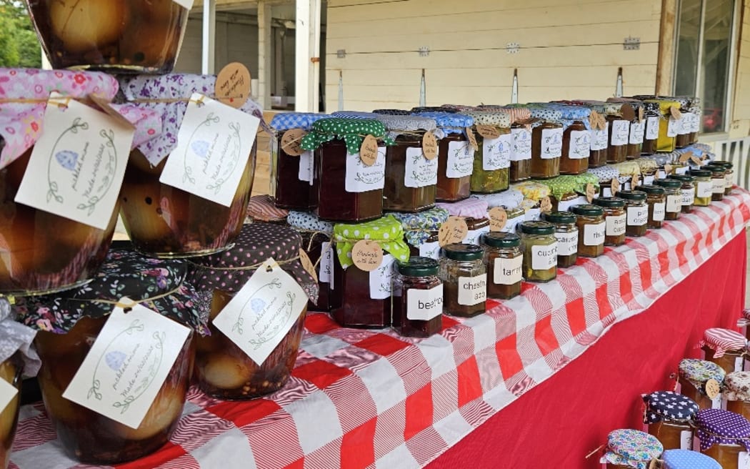 Dovecote House preserves lined up at a market stall
