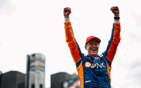 Scott Dixon celebrates his Indycar win in Detroit