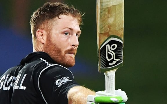 Martin Guptill celebrates his 12th ODI century.