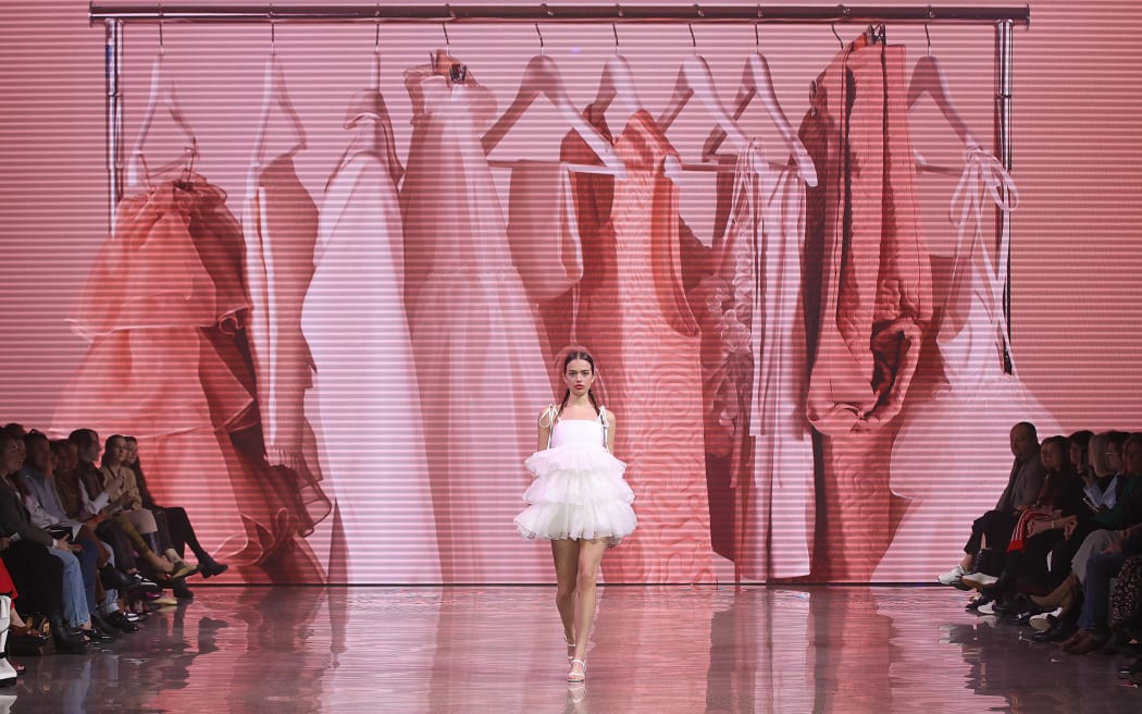 AUCKLAND, NEW ZEALAND - AUGUST 30: A model walks the runway in a design by Amelia Phillips from Otago Polytechnic during The Graduate Show during New Zealand Fashion Week 23: Kahuria at Viaduct Events Centre‎ on August 30, 2023 in Auckland, New Zealand.