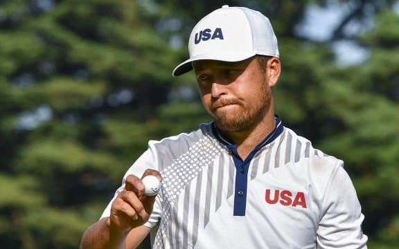 USA's Xander Schauffele reacts after finishing round 3 of the men's golf individual stroke play during the Tokyo 2020 Olympic Games at the Kasumigaseki Country Club in Kawagoe on July 31, 2021.