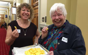 Biddy Fraser Davies and Jill Whalley offered raw milk cheese to a select committee to taste.