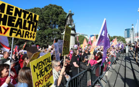 Budget Day 2025 - pay equity protestors voice their opinions outside Parliament