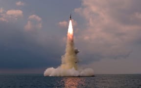 This picture taken on October 19, 2021 and released from North Korea's official Korean Central News Agency (KCNA) on October 20, 2021 shows test fire of a new type submarine-launched ballistic missile in an undisclosed location in North Korea.