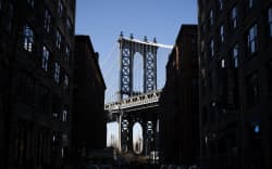 United States, New York, NY, 2024-03-24. The Manhattan Bridge from a street in the Brooklyn district of New York City. Photograph by Norbert Grisay / Hans Lucas.
United States, New York, NY, 2024-03-24. Le pont de Manhattan depuis une rue du quartier de Brooklyn dans ville de New York City. Photographie de Norbert Grisay / Hans Lucas. (Photo by Norbert Grisay / Hans Lucas / Hans Lucas via AFP)