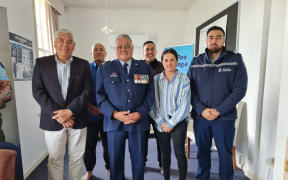 Sergeant Wayne Panapa (center), with members of Te Pae Oranga in Hamilton.