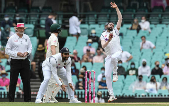 Mohammed Siraj playing against Australia in the third test at the Sydney Cricket Ground.
Officials say he was subjected to racial abuse and they are still trying to trace the offenders.