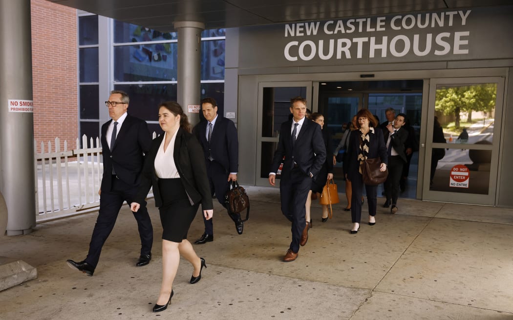 Members of the Dominion Voting Systems legal team leave the Leonard Williams Justice Center where Dominion was suing Fox News in Delaware Superior Court.