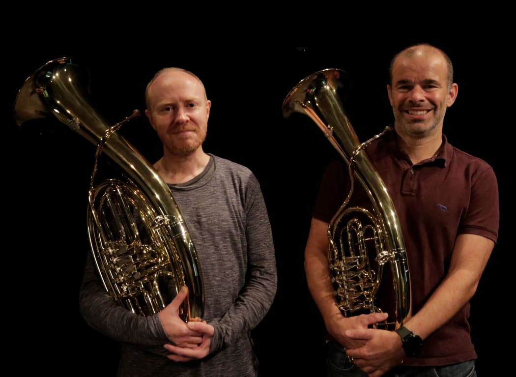 Dillon Mayhew and Euan Harvey hold Wagner tubas