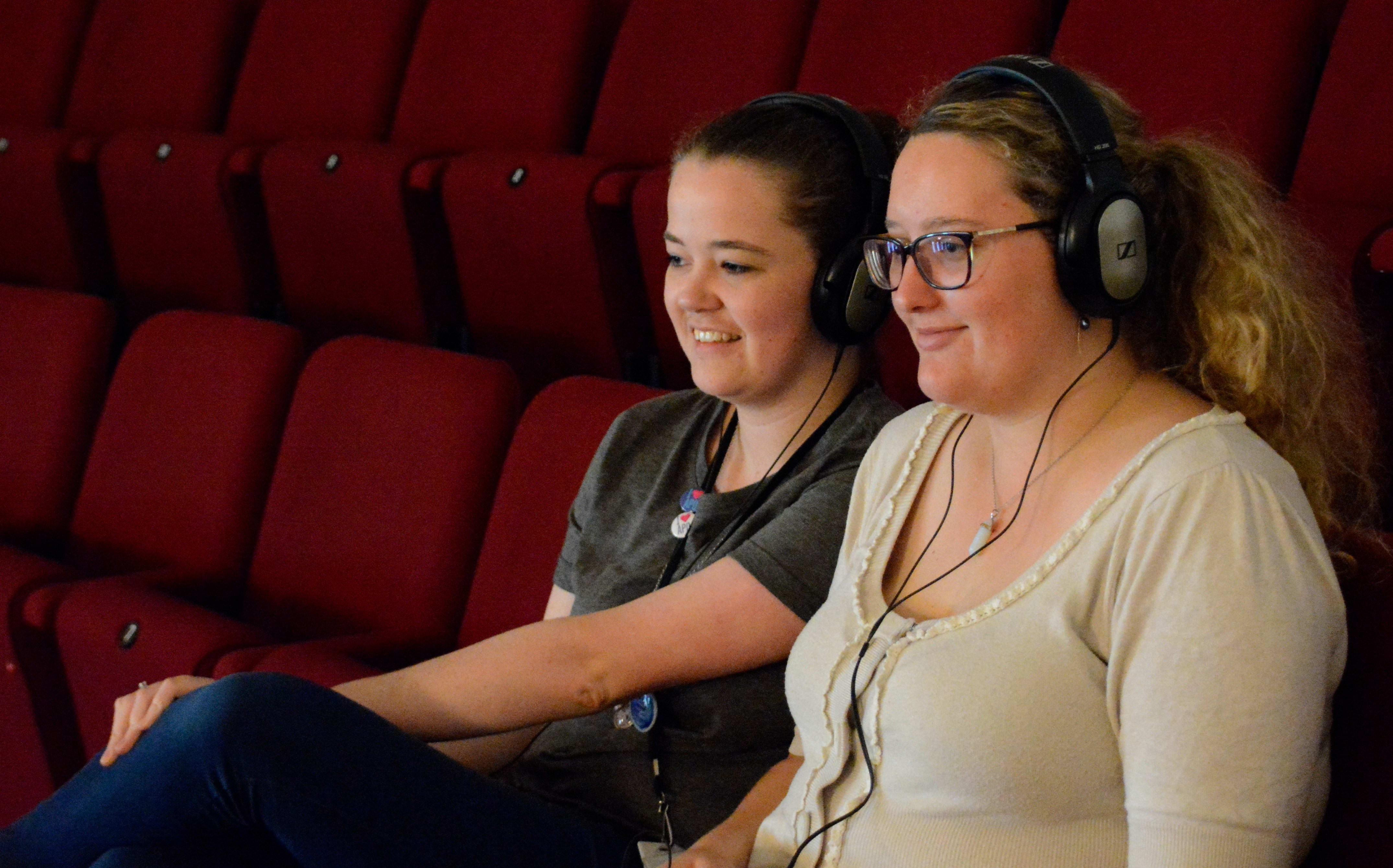 The APO's Katie Deller and Rowan Newton test out the new device to help those with hearing sensitivity at concerts