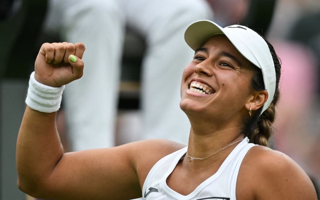 Spain's Jessica Bouzas Maneiro celebrates winning against Czech Republic's Marketa Vondrousova during their women's singles tennis match on the second day of the 2024 Wimbledon Championships at The All England Lawn Tennis and Croquet Club in Wimbledon, southwest London, on July 2, 2024. (Photo by ANDREJ ISAKOVIC / AFP) / RESTRICTED TO EDITORIAL USE